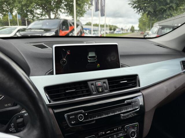 BMW X1 sDrive20i Automaat!! | Trekhaak | PDC | Clima | Cruise | Stoelverwarming | LM Velgen RIJKLAARPRIJS INCL 12 MAANDEN GARANTIE EN BEURT