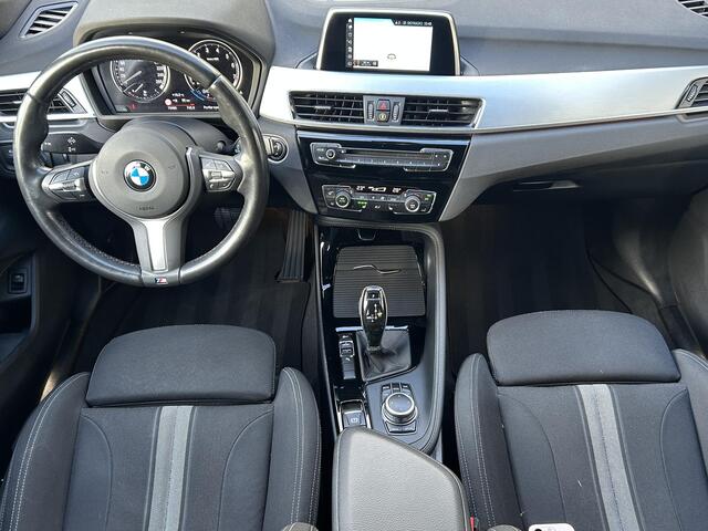BMW X1 sDrive20i High Executive l Sfeer verlichting l Navi l Trekhaak l Electrische Klep