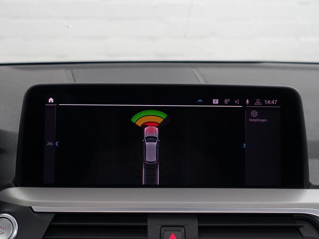 BMW X3 xDrive30e High Executive Aut- Panoramadak, Stuur/Stoelverwarming, Sfeerverlichting, Standkachel, Sport Interieur