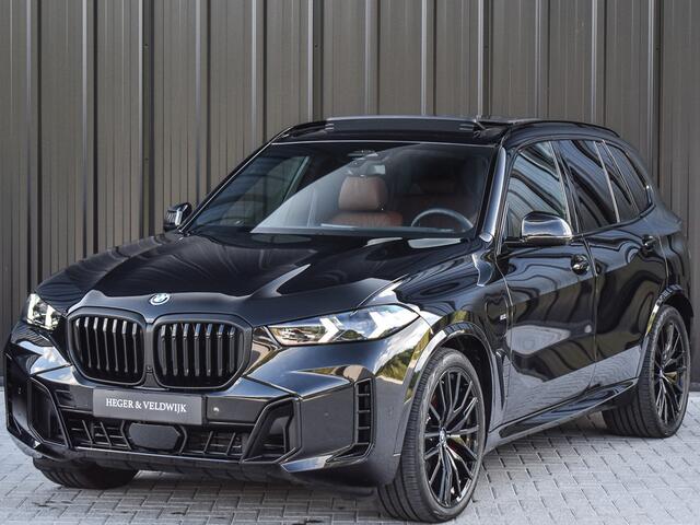 BMW X5 xDrive50e | M-SPORT | ICONIC GLOW | COMFORT ACCESS | CARBON INLEG | SOFT-CLOSE | TREKHAAK | PANORAMADAK | COMFORT SEATS | ADAPTIVE LED | ACTIVE CRUISE | HARMAN/KARDON | ALCANTARA HEMEL | HEAD-UP