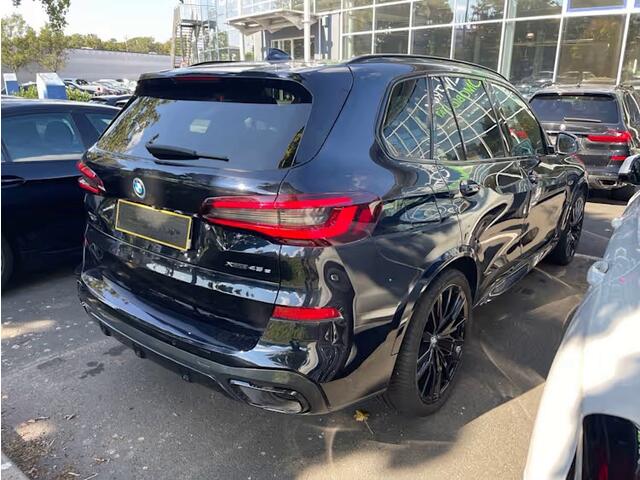 BMW X5 xDrive45e High Executive M-Sport Panoramadak Head-Up Display 22 Inch Laser Licht Trekhaak 4WD Besturing Buitenspiegels M Carbon Keyless Entry