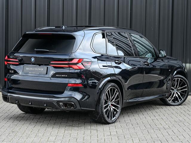 BMW X5 XDRIVE 50e | M-SPORT PRO | PANORAMADAK | AMBIANCE INTEIRUER | ACTIVE CRUISE | ICONIC GLOW | CARBON BLACK | COMFORT ACCESS | COMFORT SEATS | SHADOW LINE | PANO | LUCHTVERING | 360 CAMERA | HEAD-UP | STUUR- EN STOELVERWARMING | HARMAN/KARDON