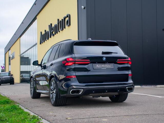 BMW X5 xDrive50e | Trekhaak | M Sport | Achteras besturing | Schuif-/kantel Pano | Softclose | Adapt. LED | Head-up | Stuurwielverwarming