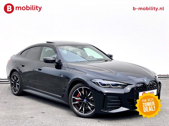 BMW i4 M50 544Pk High Executive 84 kWh Elektrisch verstelbare stoelen | Trekhaak 1600kg | Schuif/Kanteldak | Driving Assistant Professional | Harman Kardon Sound System | Head Up Display | Verwarmbaar stuurwiel | Interieurlijsten Carbon Fibre | Parking Assist.