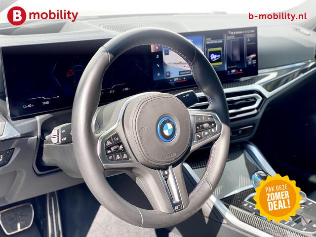 BMW i4 M50 544Pk High Executive 84 kWh Elektrisch verstelbare stoelen | Trekhaak 1600kg | Schuif/Kanteldak | Driving Assistant Professional | Harman Kardon Sound System | Head Up Display | Verwarmbaar stuurwiel | Interieurlijsten Carbon Fibre | Parking Assist.