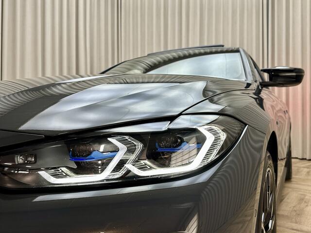 BMW i4 M50 84 kWh *M-Sport* Schuif/Kantel dak / Carbon / LASER LED / HUD / Harman Kardon / 360 Camera / Elek. Trekhaak / Org.NL!