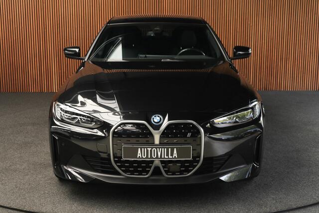 BMW i4 eDrive40 84 kWh M-pakket Navi Leer Elektr. achterklep 360° Camera Co-pilot Climate voor & achter Zwarte hemelbekleding PDC LM velgen BTW auto