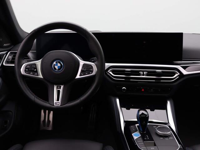 BMW i4 M50 | High Executive 84 kWh | M Sportpakket | Trekhaak | Driving Assistant Professional | Panoramadak