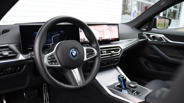 BMW i4 eDrive35 High Executive M-Sport | Harman/Kardon | Schuifdak | Head-up | Trekhaak | Driving Assistant Professional
