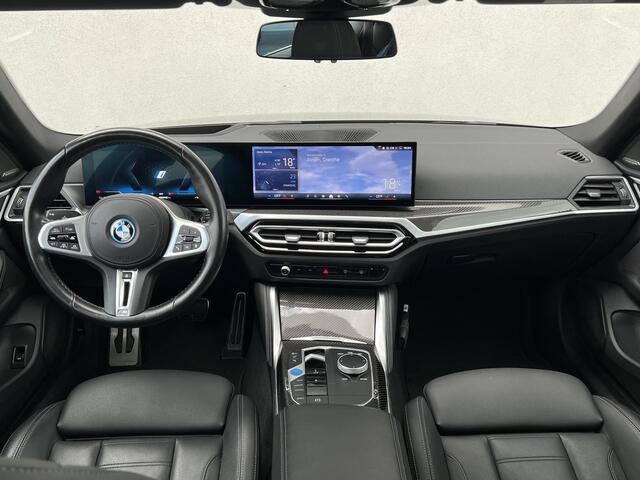 BMW i4 M50 High Executive 84 kWh Sport Pro | High Executive | Glazen schuif-/kanteldak | Stuur- en stoelverwarming | Trekhaak | Comfort Access | Laserlight | Harman Kardon | Head-Up