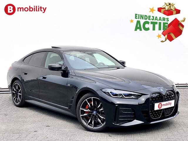 BMW i4 M50 544Pk High Executive 84 kWh Elektrisch verstelbare stoelen | Trekhaak 1600kg | Schuif/Kanteldak | Driving Assistant Professional | Harman Kardon Sound System | Head Up Display | Verwarmbaar stuurwiel | Interieurlijsten Carbon Fibre | Parking Assist.