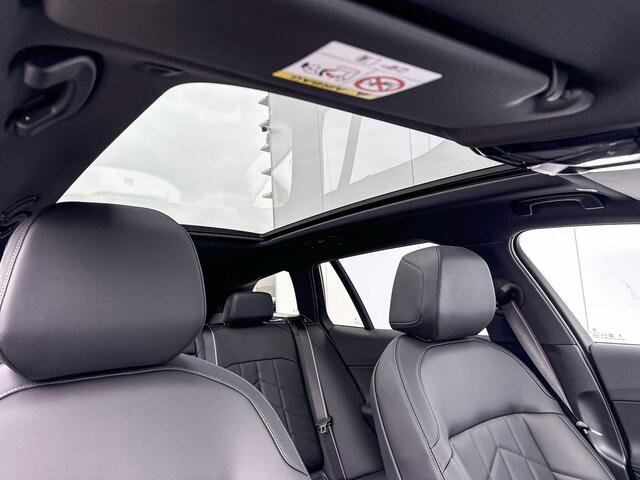 BMW i5 Touring eDrive40 M Sport Pro Glazen Dak / Harman Kardon / Comfortstoelen / Stoelventilatie / Iconic Glow / Getinte ramen / 20 Inch