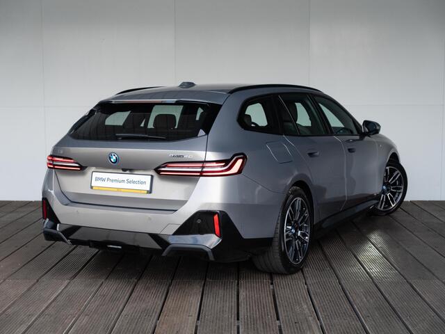 BMW i5 Touring eDrive40 | M Sportpakket | Driving Assistant Plus | Achteruitrijcamera | Stoelverwarming | Trekhaak