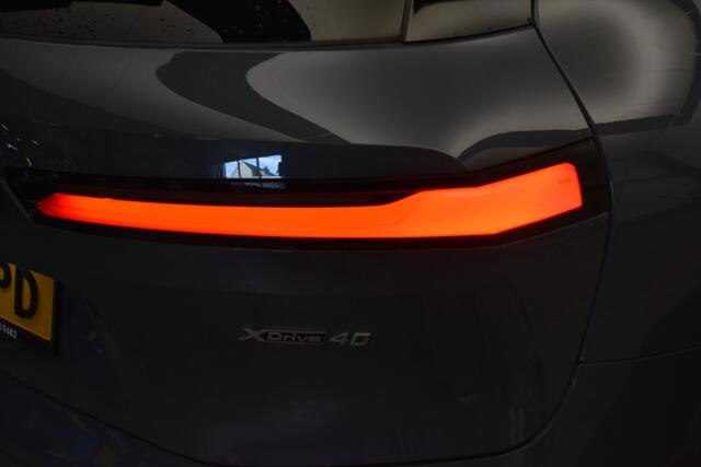 BMW iX xDrive40 High Executive 77 kWh El Trekhaak Panodak Head Up Camera