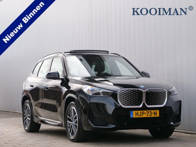 BMW iX1 eDrive20 67 kWh 304 Pk M-sport pakket Pano-dak / Trekhaak / DAB / Navi / Apple Carplay