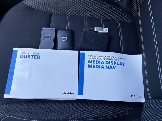Dacia DUSTER 1.0 TCe Prestige / Trekhaak (1.500 kg) / Dode hoek detectie / Stoelverwarming / Achteruitrijcamera / Navi / Apple Carplay Android