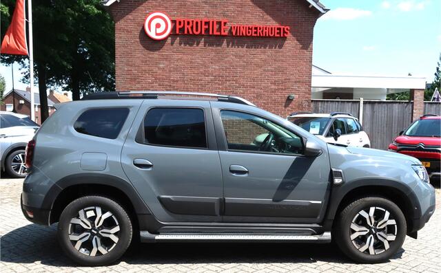 Dacia DUSTER 150 Pk Benzine *** AUTOMAAT * Ruige Stoere Journey Uitvoering * Navigatie * Achteruitrij Camera * Stoelverwarming * Dodehoekdetector * Climate & Cruise Control * Hoge Zit * Stoere Kleur * Vingerhoets; Vierde Generatie Eersteklas Service !