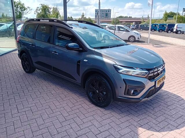 Dacia Jogger 1.6 Hybrid 140 Extreme 7p. Automaat, Airco(automatisch), Carplay/Android auto, Navigatie, Parkeersensoren, Camera, Cruise control, Stoelverwarming, Dode hoek detector, Elektrische ramen en spiegels, Keyless, Regensensor, Dimlicht automatisch, 1e eigenaar,