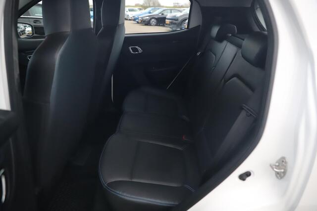 Dacia Spring Business 27 kWh Automaat Leder Navigatie Camera Airco Cruise 14 inch LMV Elektrische Ramen