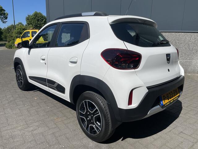 Dacia Spring Comfort Plus (Orange Pack) 27 kWh Mistlampen - Achteruitrijcamera - Airco - Navigatie - Cruise control - Parkeersensoren achter - Dakrails