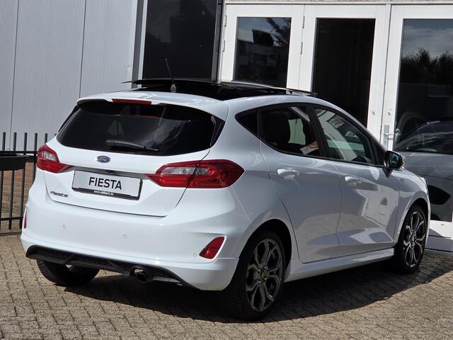 Ford FIESTA 1.0 ST-Line PANORAMADAK|NAVIGATIE|CAMERA|CRUISE CONTROL|STOEL&STUUR VERWARMING|ECC/AIRCO|PDC ACHTER|17 INCH|DEALERE ONDERHOUDEN Maandag tot Vrijdag geopend van 09.00 tot 20.00 uur en Zaterdag van 09.00 tot 18.00 uur