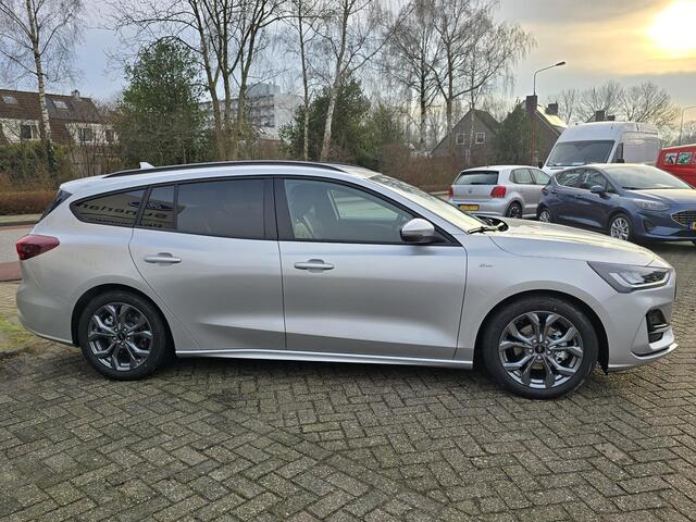 Ford FOCUS 1.0 EcoBoost Hybrid ST Line Wagon 155pk Automaat SCI | April leverbaar | Winter Pack | Moondust Silver | 12.3 inch personaliseerbare Digital Cockpit | Achteruitrijcamera | Draadloos opladen mobiele telefoon | Ford Keyless Entry