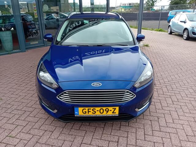 Ford FOCUS Wagon 1.5 Titanium Automaat 150 PK, Airco(automatisch), Multimediasysteem, Carplay/Android auto, Navigatie, Camera, Parkeersensoren, Parkeerhulp, Cruise control, Stoelverwarming, Verwarmd stuurwiel, Verwarmde voorruit, Keyless, Half lederen bekleding, Tre