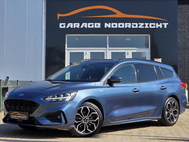Ford FOCUS Wagon 1.5 EcoBoost ST Line Business NAVIGATIE|CAMERA|PDC VOOR+ACHTER|GETINT GLAS|18 INCH Maandag tot Vrijdag geopend van 09.00 tot 20.00 uur geopend en Zaterdag van 09.00 tot 18.00 uur