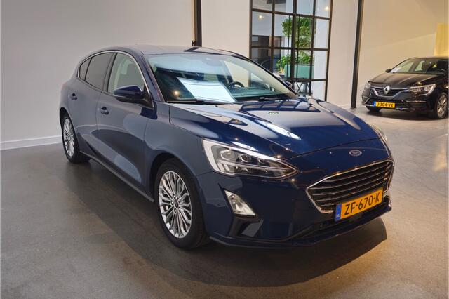 Ford FOCUS 1.0 EcoBoost Titanium Business - Automaat - Stoel/Stuurverwarming - Adaptive cruisecontrol - Apple Carplay/Android Auto - Head-up display