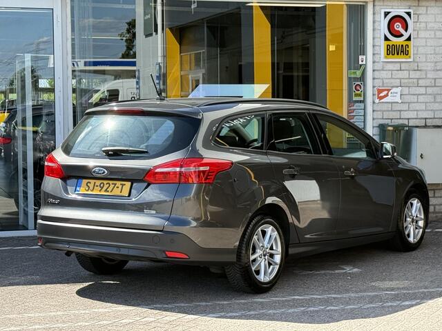 Ford FOCUS Wagon 1.0 Lease Edition | NAP | 100% dlr onderhouden | Navigatie | Cruise Control | Parkeersensoren | Airco | Lichtmetaal | BT-Telefoonfunctie |