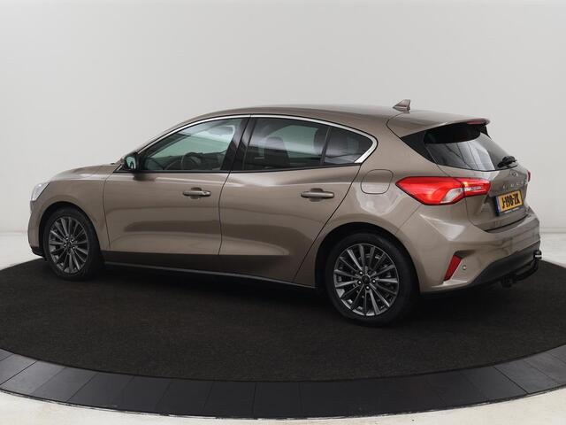 Ford FOCUS 1.0 EcoBoost Titanium | Trekhaak | Stoel & stuurverwarming | Carplay | Navigatie | Climate control | Keyless | Cruise control | Parkeerhulp | Bluetooth