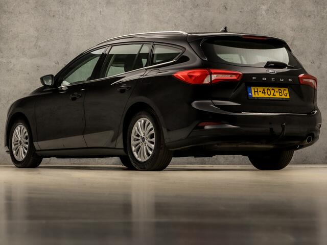 Ford FOCUS Wagon 1.0 EcoBoost Titanium Sport Automaat (APPLE CARPLAY, GROOT NAVI, CLIMATE, TREKHAAK, SPORTSTOELEN, KEYLESS, LED KOPLAMPEN, LM VELGEN, LANE ASSIST, NIEUWSTAAT)