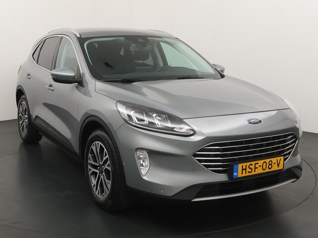 Ford KUGA 2.5 PHEV 225 pk Titanium | Trekhaak | Winter Pack | Adapt. cruise | Camera's | 18" | Navi | Clima