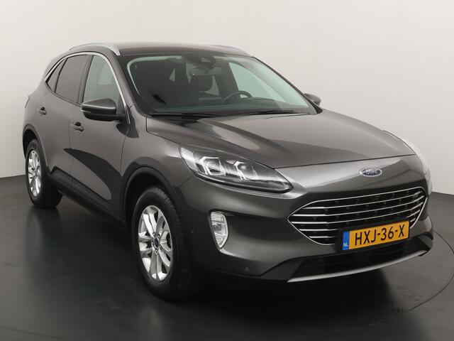 Ford KUGA 2.5 PHEV 225 pk Titanium | Winter Pack | El. a. klep | Adapt. cruise | Adapt. LED | 4 seiz. banden