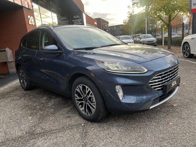 Ford KUGA 2.5 PHEV Titanium X // ADAPT. CRUISE // DODEHOEK // B&O SOUND // KEYLESS // NAVI+CARPLAY // WINTERPACK // FULL LED //