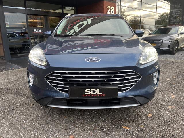 Ford KUGA 2.5 PHEV Titanium X // ADAPT. CRUISE // DODEHOEK // B&O SOUND // KEYLESS // NAVI+CARPLAY // WINTERPACK // FULL LED //