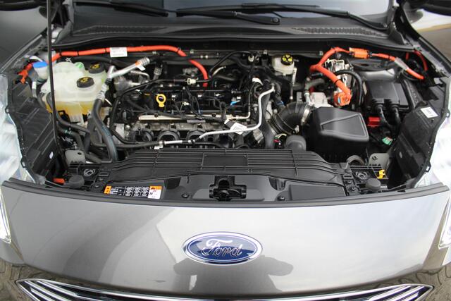 Ford KUGA 2.5-225pk PHEV Titanium X. Hybride rijden voor een reële prijs ! Stoel-, stuur- en voorraamverw., navigatie, telefoonvoorb., B&O soundsyst., side- en lane assist, adapt. cruise cntrl, elektr. achterklep, elektr. verstelb., best. stoel, lm wielen, camera v