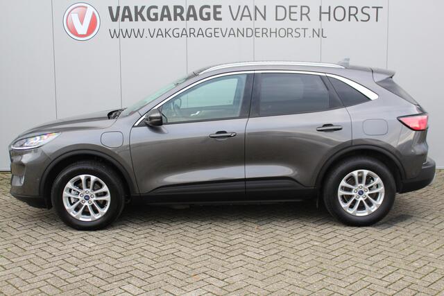 Ford KUGA 2.5-225pk PHEV Titanium X. Hybride rijden voor een reële prijs ! Stoel-, stuur- en voorraamverw., navigatie, telefoonvoorb., B&O soundsyst., side- en lane assist, adapt. cruise cntrl, elektr. achterklep, elektr. verstelb., best. stoel, lm wielen, camera v
