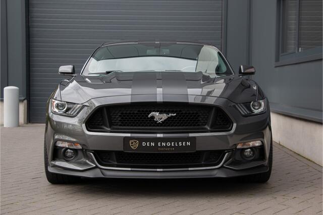 Ford MUSTANG Fastback 5.0 V8 GT | Performance | Handgeschakeld | Ventilatie + Verwarming | Navigatie | MBRP Sportuitlaat | Performance Package | Shaker Audio | Camera | Memory | USA | Drive Mode | Steering Feel | Cruise Control | 19"| Lowjack |