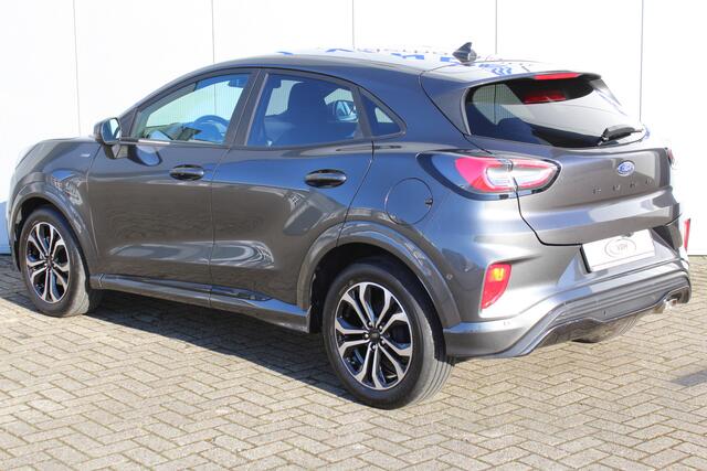Ford PUMA 1.0-125pk EcoBoost Hybrid ST-Line. April 2024 ! Slechts 11.800km ! Autm. airco, navigatie, telefoonvoorb., camera, pdc v+a, parkeerassistent, LED verl., metallic lak, LM wielen, stoel-, stuur- en voorraamverw., lane- en sideassist, adapt. cruise cntrl etc