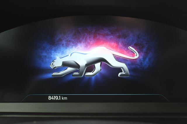 Ford PUMA 1.0-125pk EcoBoost Hybrid ST-Line. April 2024 ! Slechts 8.400km ! Autm. airco, navigatie, telefoonvoorb., camera, pdc v+a, parkeerassistent, LED verl., metallic lak, LM wielen, stoel-, stuur- en voorraamverw., lane- en sideassist, adapt. cruise cntrl etc