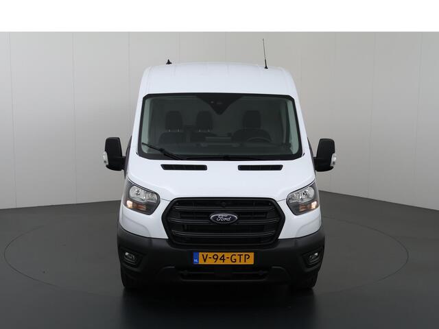 Ford TRANSIT 350 2.0 TDCI L3 H2 Trend | Navigatie | Stoelverwarming | Trekhaak 2500 KG AHW | Airco | 3-Zits | NIEUW | Carplay - Android Auto | Laadruimte Pakket | Cruise Control | Multifuntioneel Stuurwiel