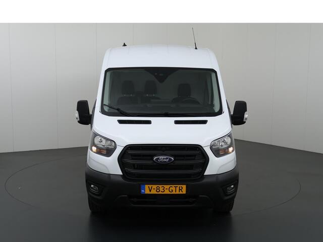 Ford TRANSIT 350 2.0 TDCI L3 H2 Trend | Navigatie | Stoelverwarming | Trekhaak 2500 KG AHW | Airco | 3-Zits | NIEUW | Carplay - Android Auto | Laadruimte Pakket | Cruise Control | Multifuntioneel Stuurwiel