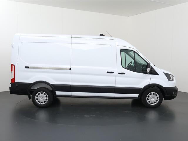 Ford TRANSIT 350 | 2.0 TDCI | L3 H2 | Trend | TREKHAAK 2500KG AHW | CLIMATE CONTROL | NAVIGATIE | PARKEERSENSOREN V+A | CRUISE CONTROL | BIJRIJDERSBANK | LAADRUIMTE PAKKET | APPLE CARPLAY / ANDROID AUTO | STOEVERWARMING