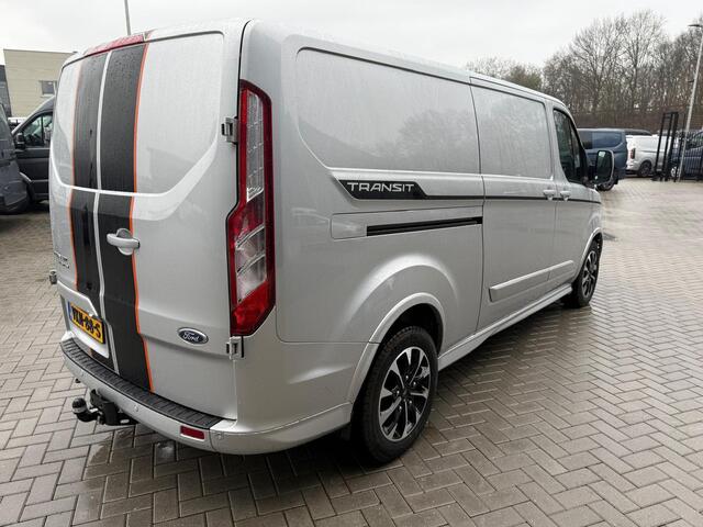 Ford TRANSIT CUSTOM 320 2.0 TDCI L2H1 Sport | Automaat 185pk | Camera | Bi-Xenon | Trekhaak | Stoelverwarming | Betimmering + Vloer | Raptor Grille