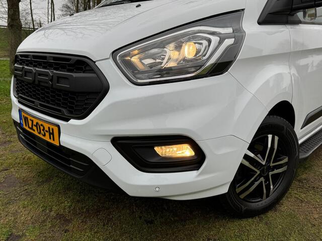 Ford TRANSIT CUSTOM 320 2.0 TDCI L2H1 Automaat | RAPTOR GRILL | SIDEBARS | CAMERA | CRUISE |