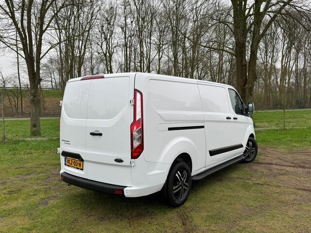 Ford TRANSIT CUSTOM 320 2.0 TDCI L2H1 Automaat | RAPTOR GRILL | SIDEBARS | CAMERA | CRUISE |
