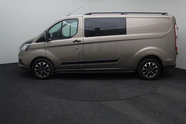 Ford TRANSIT CUSTOM 320 2.0 TDCI L2H1 Limited DC Dubbel Cabine 2020 1e eigenaar | Navigatie | Carplay | Cruise control | Airco | Trekhaak | Bluetooth | PDC | Lichtmetaal | Voorruitverwarming | Stoelverwarming |