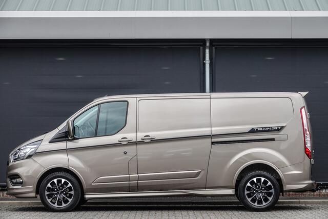 Ford TRANSIT CUSTOM L2H1 2.0Tdci 185Pk Aut. | Sport | 2xSchuifdeur | Stoel-Bank | Achteruitrijcamera | Achterspoiler | Trekhaak | 17''