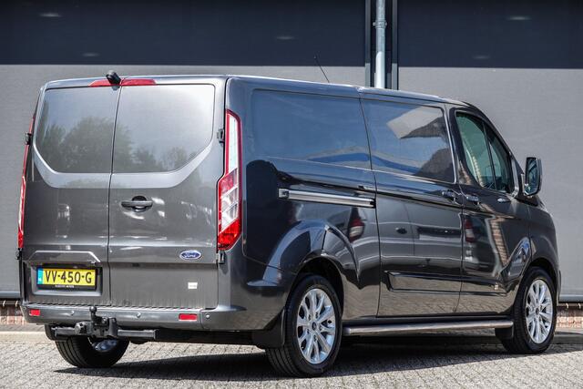 Ford TRANSIT CUSTOM L2H1 2.2Tdci 125Pk | Anniversary Edition | Stoel-Bank | Achteruitrijcamera | Trekhaak | Side Bars | 18'' | Magnetic Grey